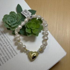 Pulsera Cristales con dije colgante en baño de oro de 14K