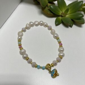 Pulsera Perla de rio y dije colgante de hongo
